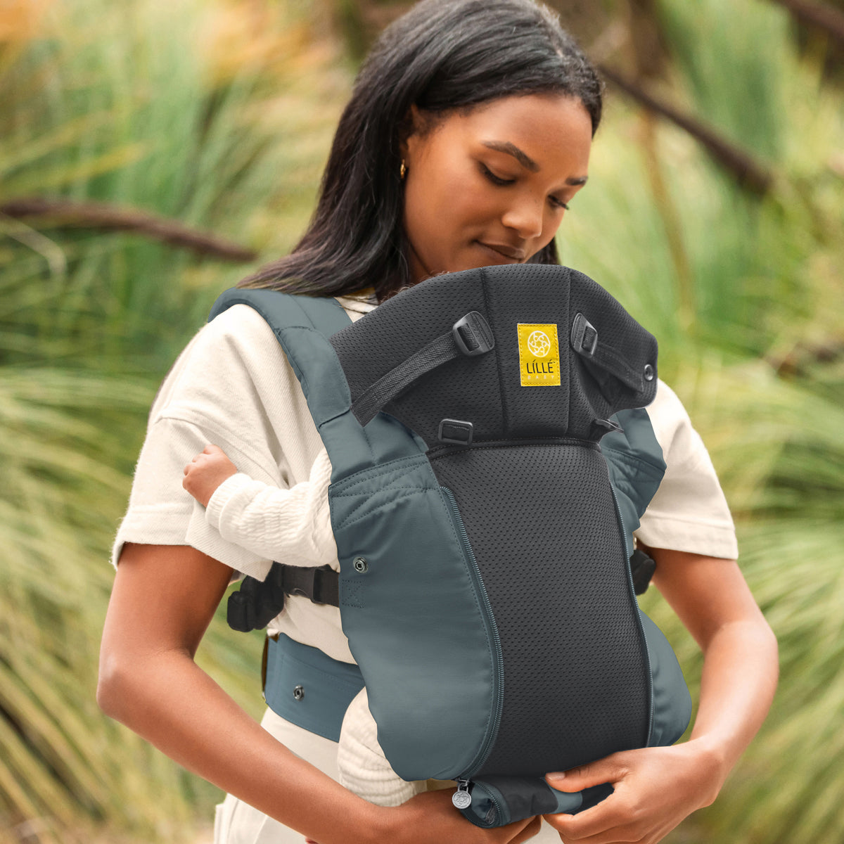 mom wearing baby in Complete 6-in-1 All Seasons in Cypress