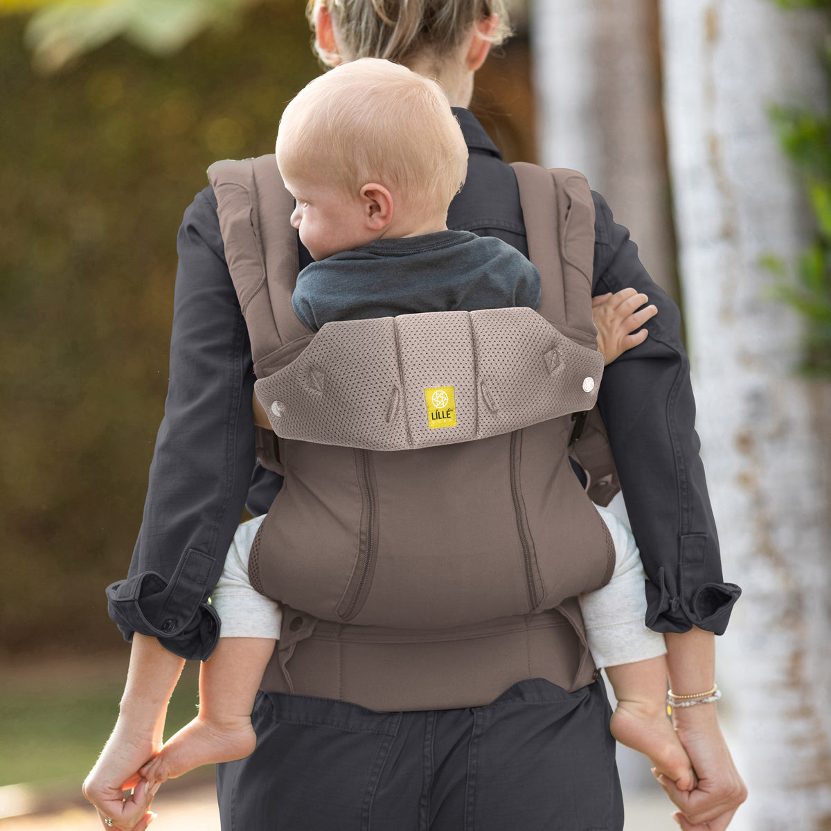 mom wearing baby in Complete 6-in-1 All Seasons in Bark