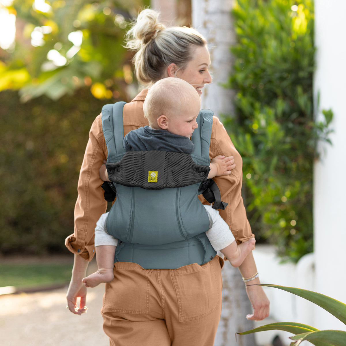 mom wearing baby in Complete 6-in-1 All Seasons in Cypress