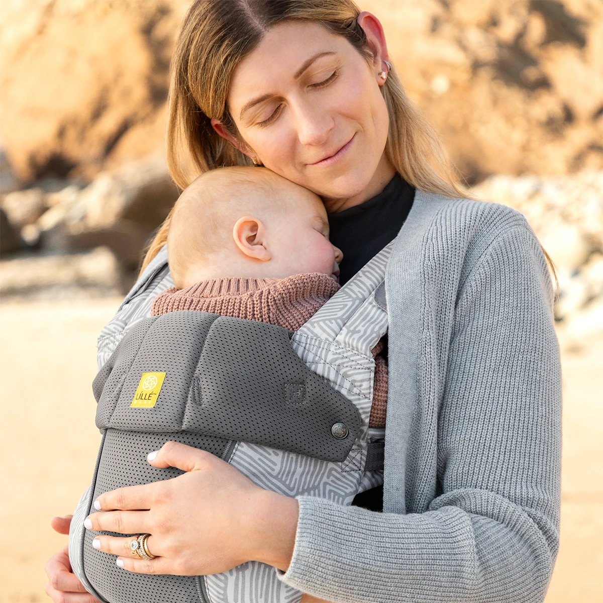 mom wearing baby in Complete 6-in-1 All Seasons in Pebble Grey