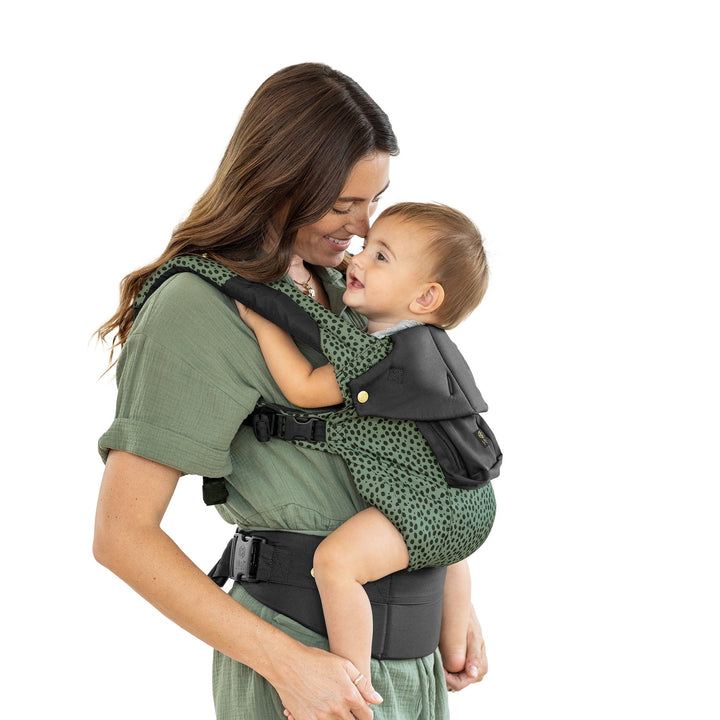 mom wearing baby in lillebaby complete luxe baby carrier in speckled succulent