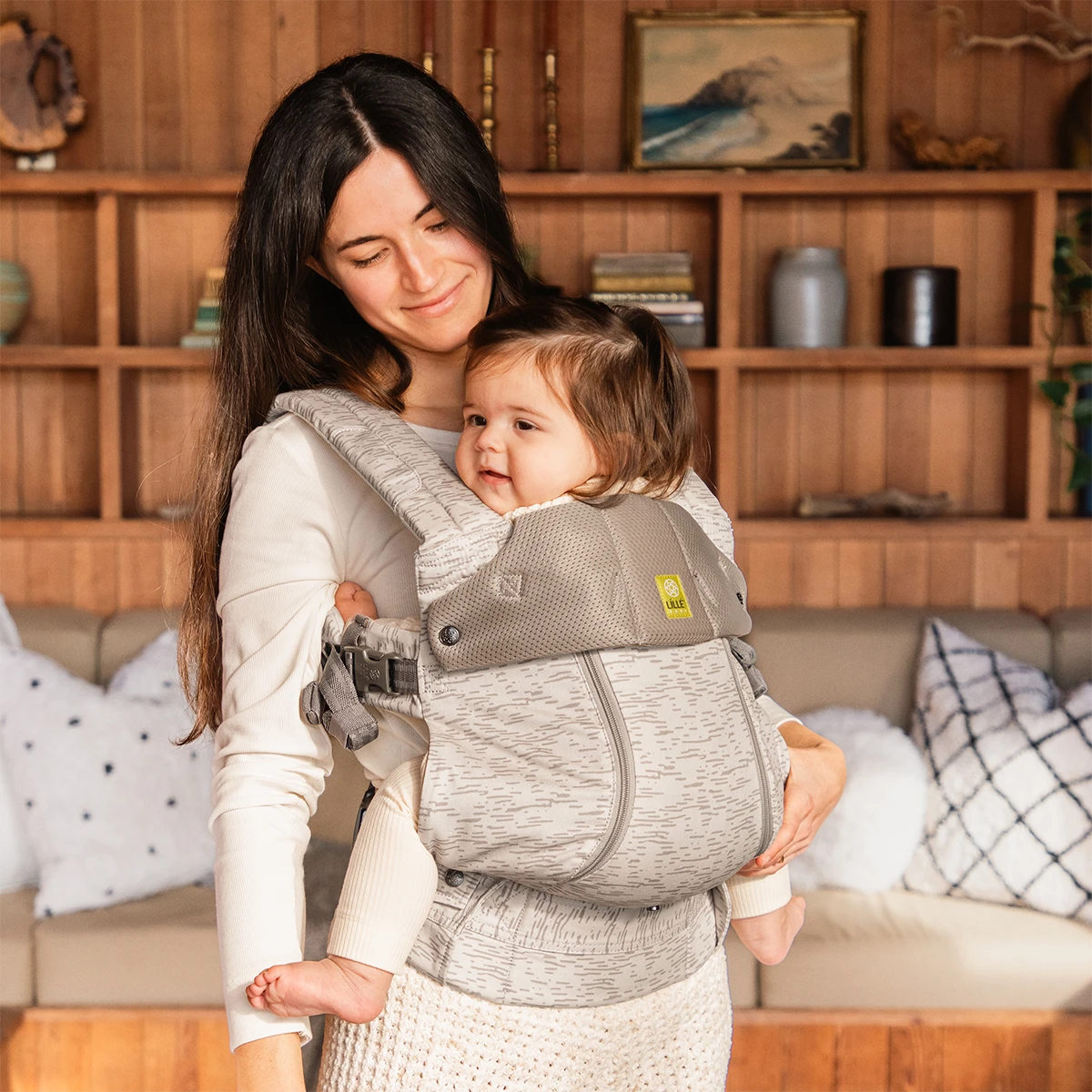 mom wearing baby in Complete 6-in-1 All Seasons in Coastal Sands