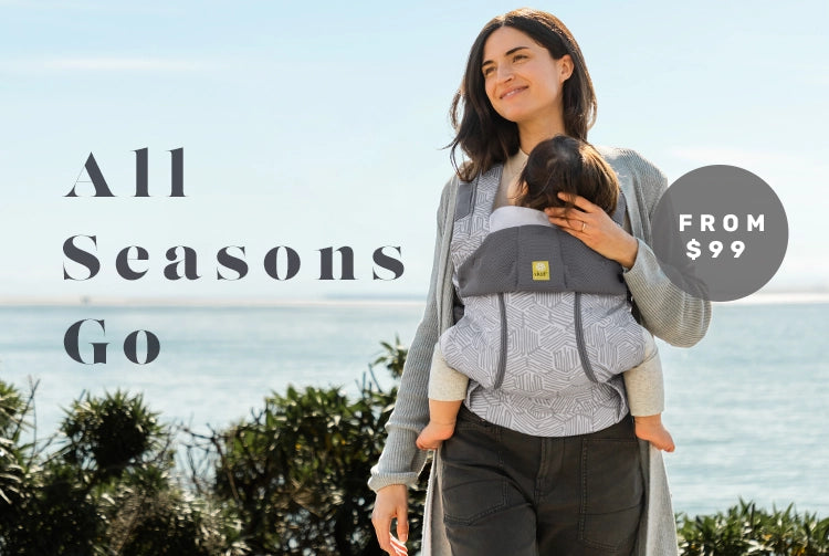 all seasons go. complete all seasons baby carriers starting from $99. mom wearing baby in complete all seasons in pebble grey