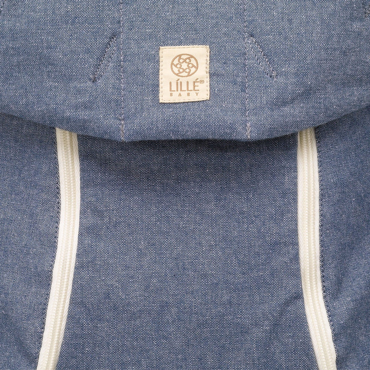 close up of lillebaby complete all seasons baby carrier in chambray