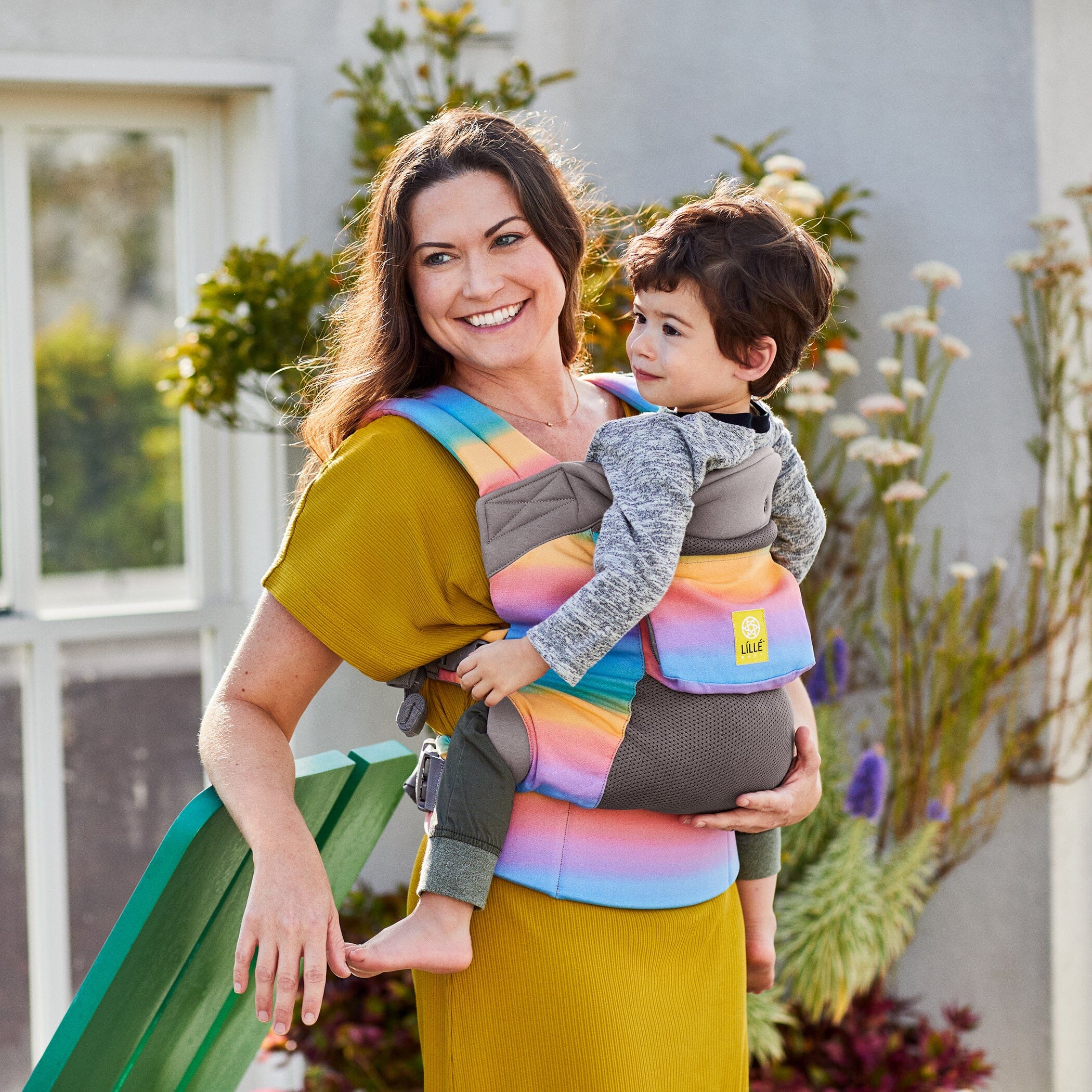 mom wearing baby in carryon airflow dlx in mystic quartz