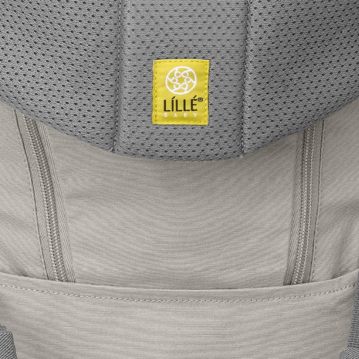 close up of lillebaby seat me all seasons baby carrier in stone