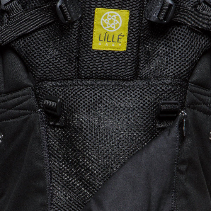 close up of lillebaby complete all seasons baby carrier in black