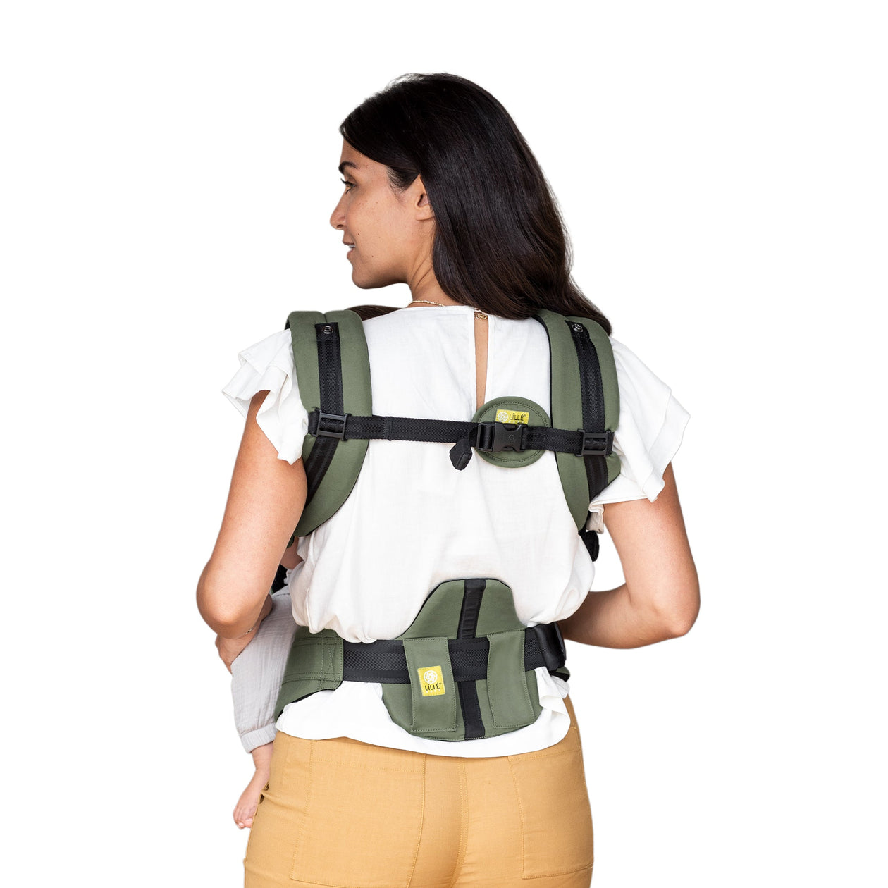 back image of mom wearing baby in lillebaby complete airflow dlx baby carrier in olive black