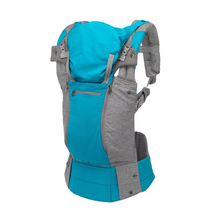 side profile image of lillebaby complete all seasons baby carrier in cool carribean iwth hood up