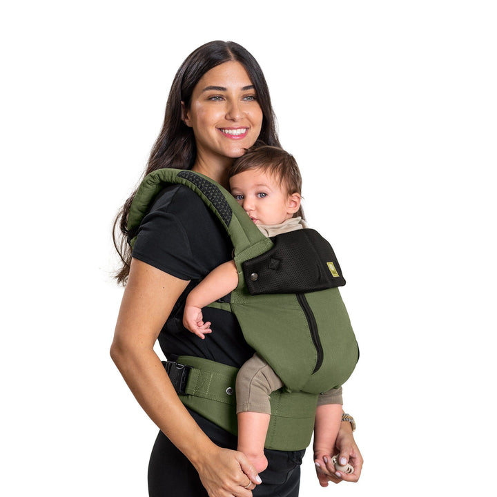 mom wearing baby in lillebaby complete all seasons baby carrier in succulent