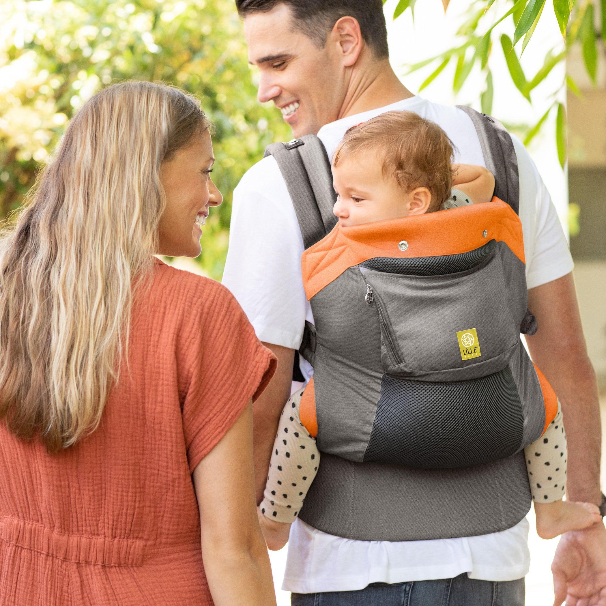 dad wearing baby in carryon airflow dlx baby carrier in sunstone