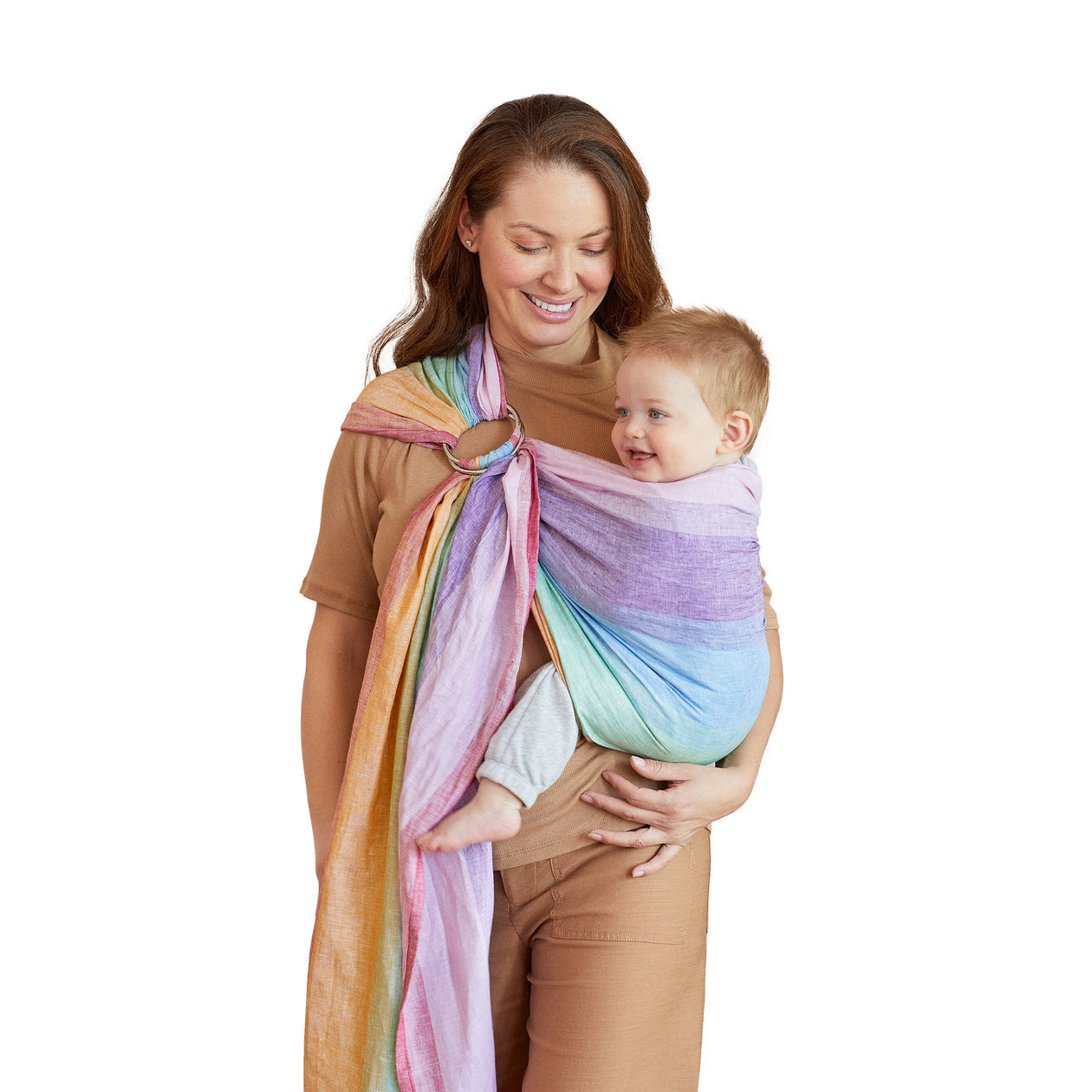 mom wearing baby in ring sling in rainbow